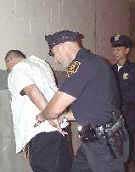 In handcuffs
