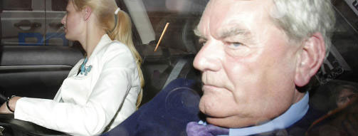 
David Irving arrives with his assistant Jae at the TV2 studios in Oslo